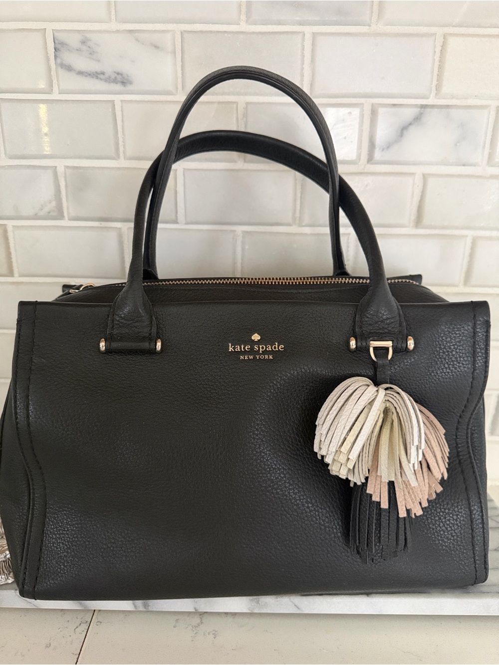 kate spade black leather satchel with multicolor tassel